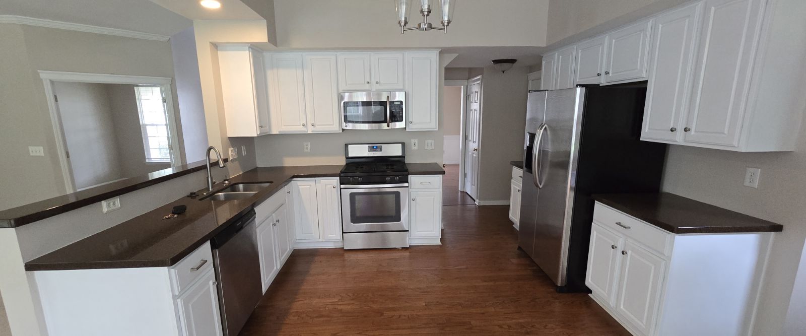 Full Interior Wall Painting & Custom Cabinet Refinishing